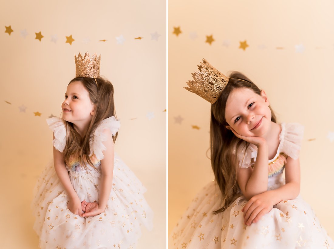 little girl with crown on and stars in the background