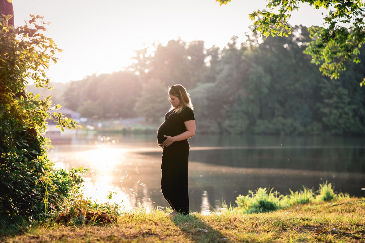 expectant mom holding her belly | Charlottesville VA Maternity Photographer