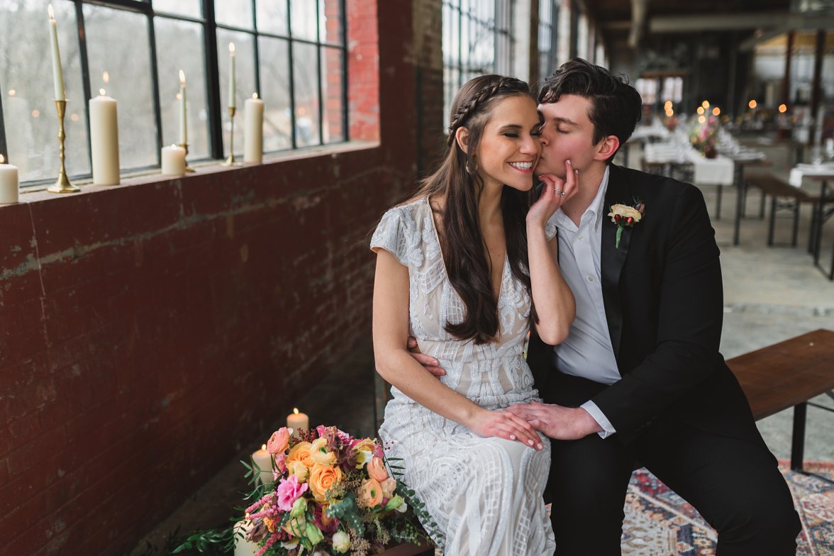 groom kissing bride on cheek | Charlottesville Wedding Photographer