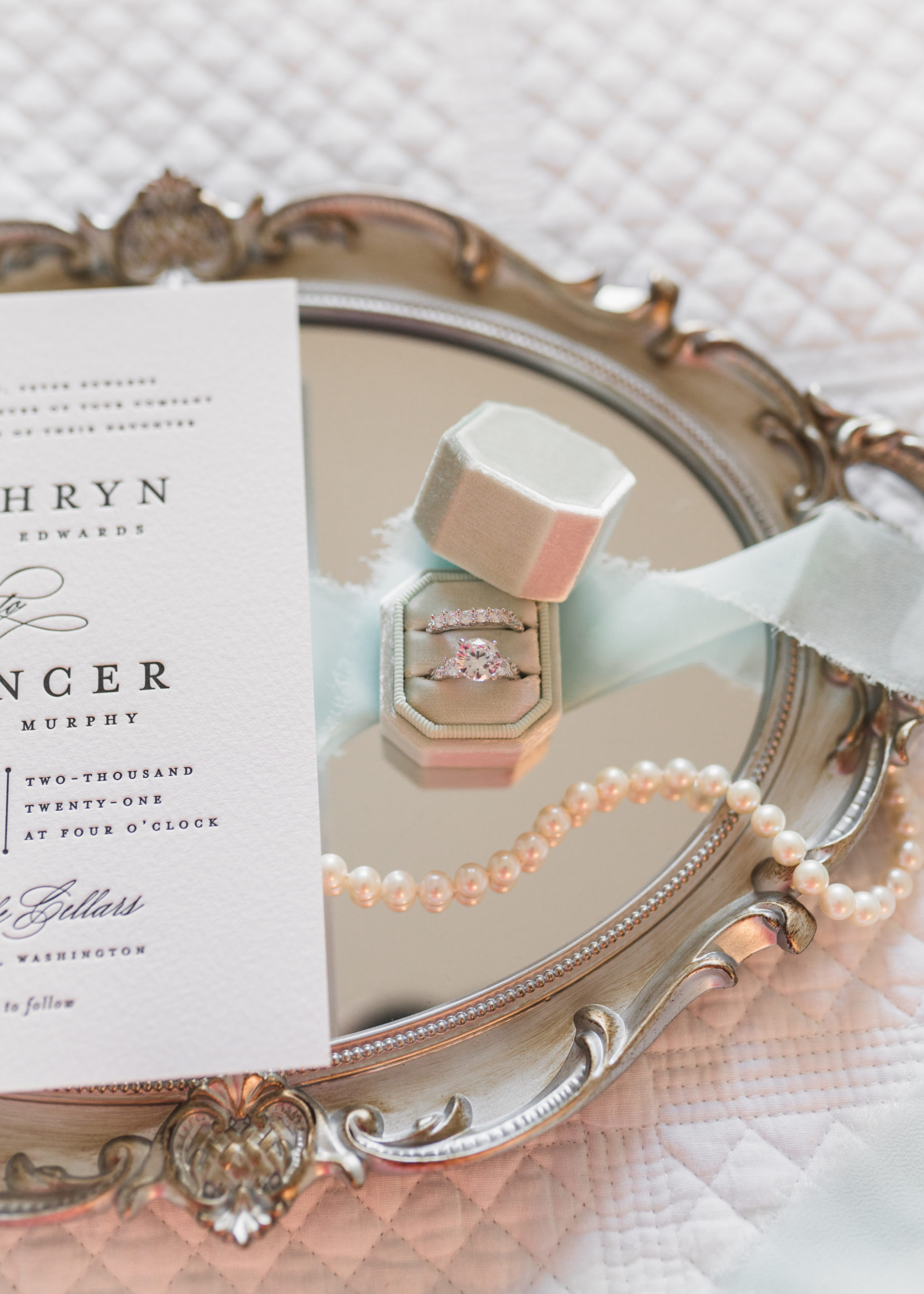 mirrored tray with ring and invitation | flat lay tips