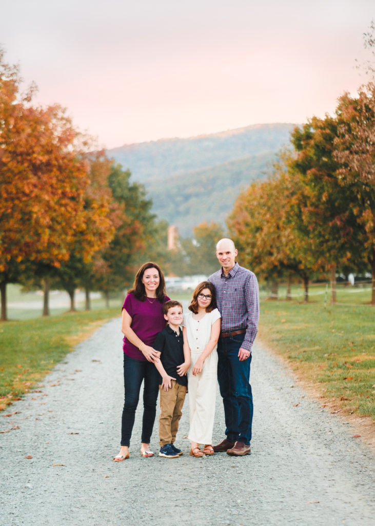 Family standing on gravel road in fall | photo sessoin locations in Charlottesville 