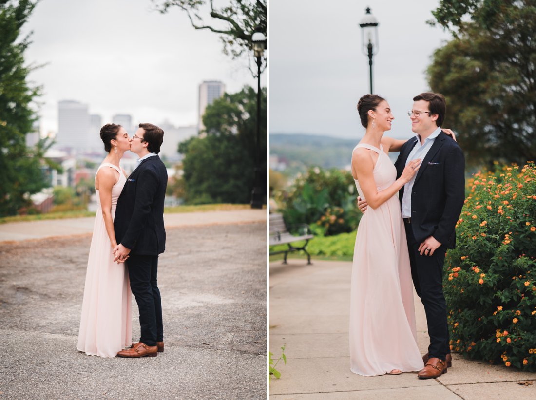 man and woman kissing in city | libby hill engagement session