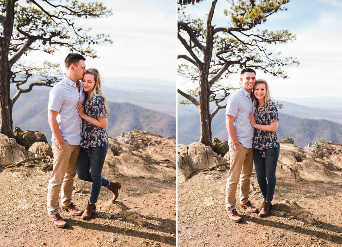 Couple standing together holding each other on mountain top | Blue Ridge Parkway Engagement Session