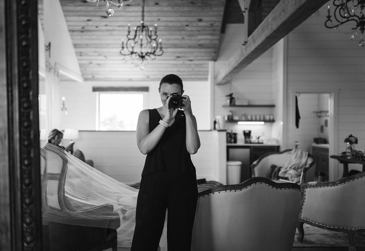 Woman holding camera to her face | Virginia Wedding Photographer Melissa Sheridan