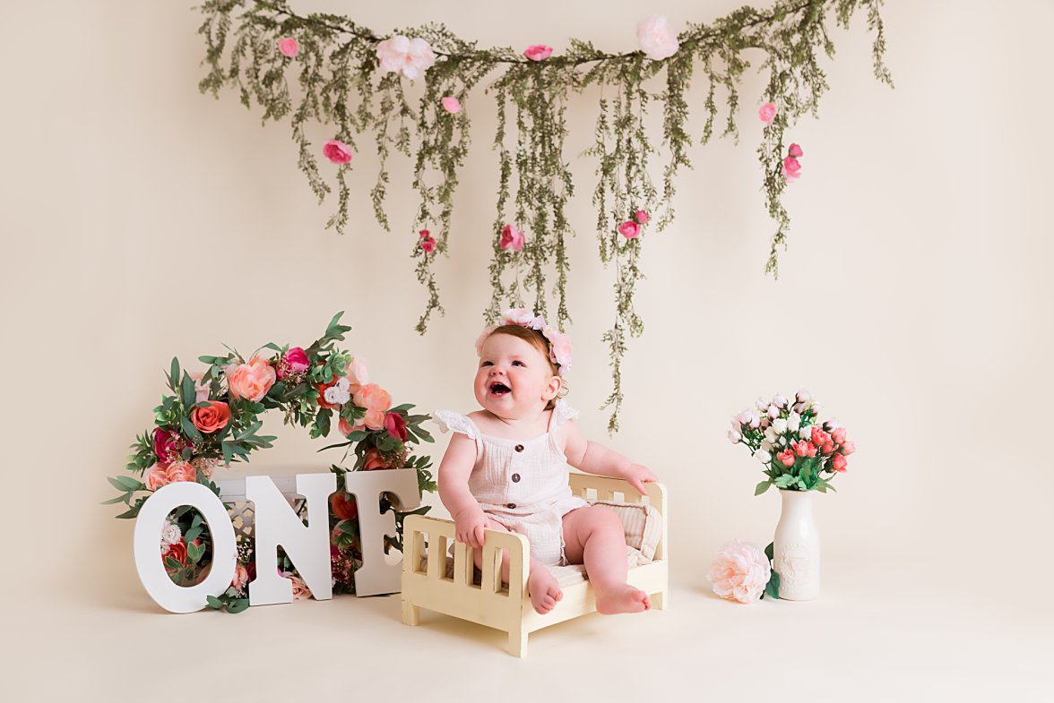 Baby girl smiling in photo studio set up | Dayton Baby Photographer