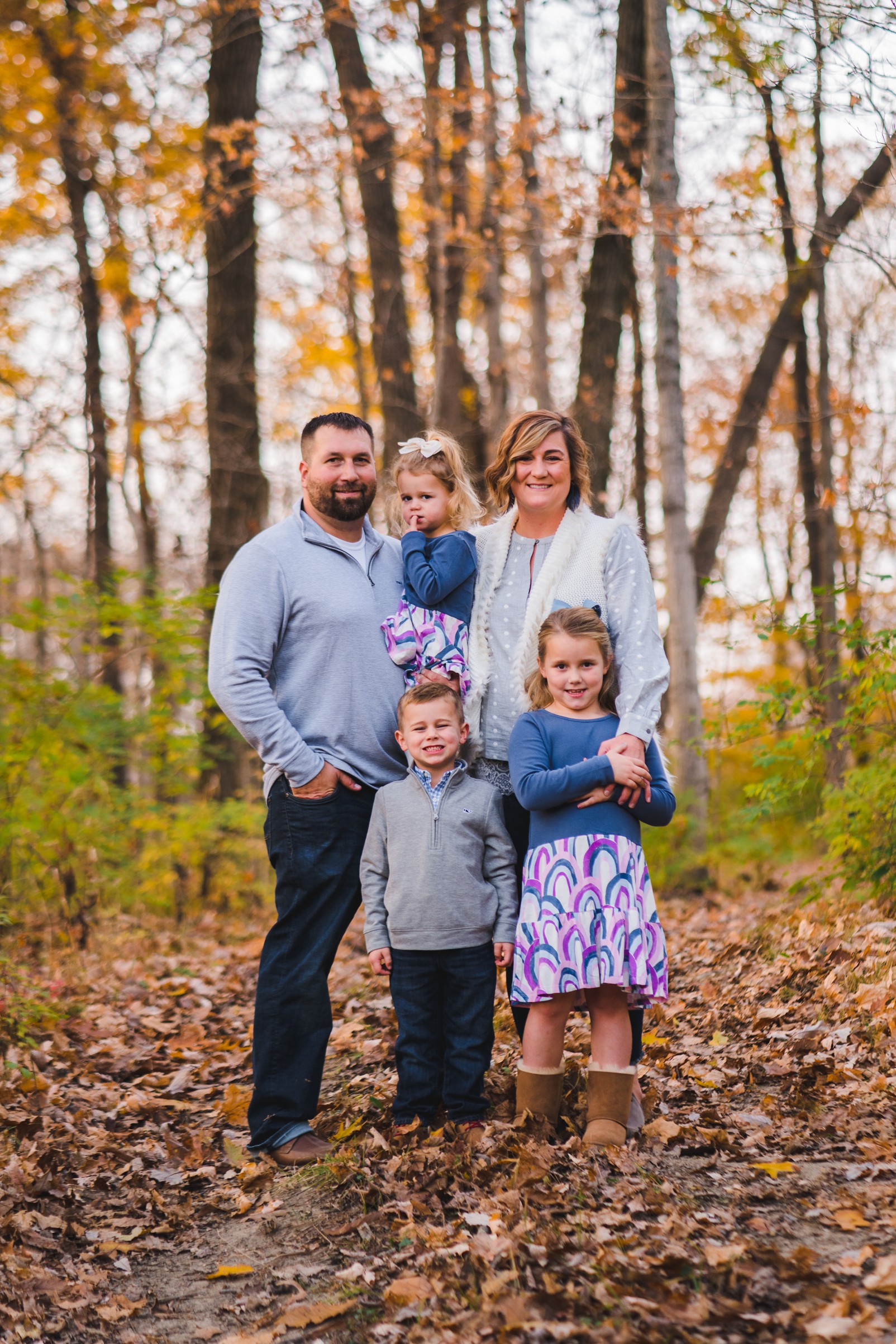 Family of five standing in the leaves | Photographer Dayton Ohio