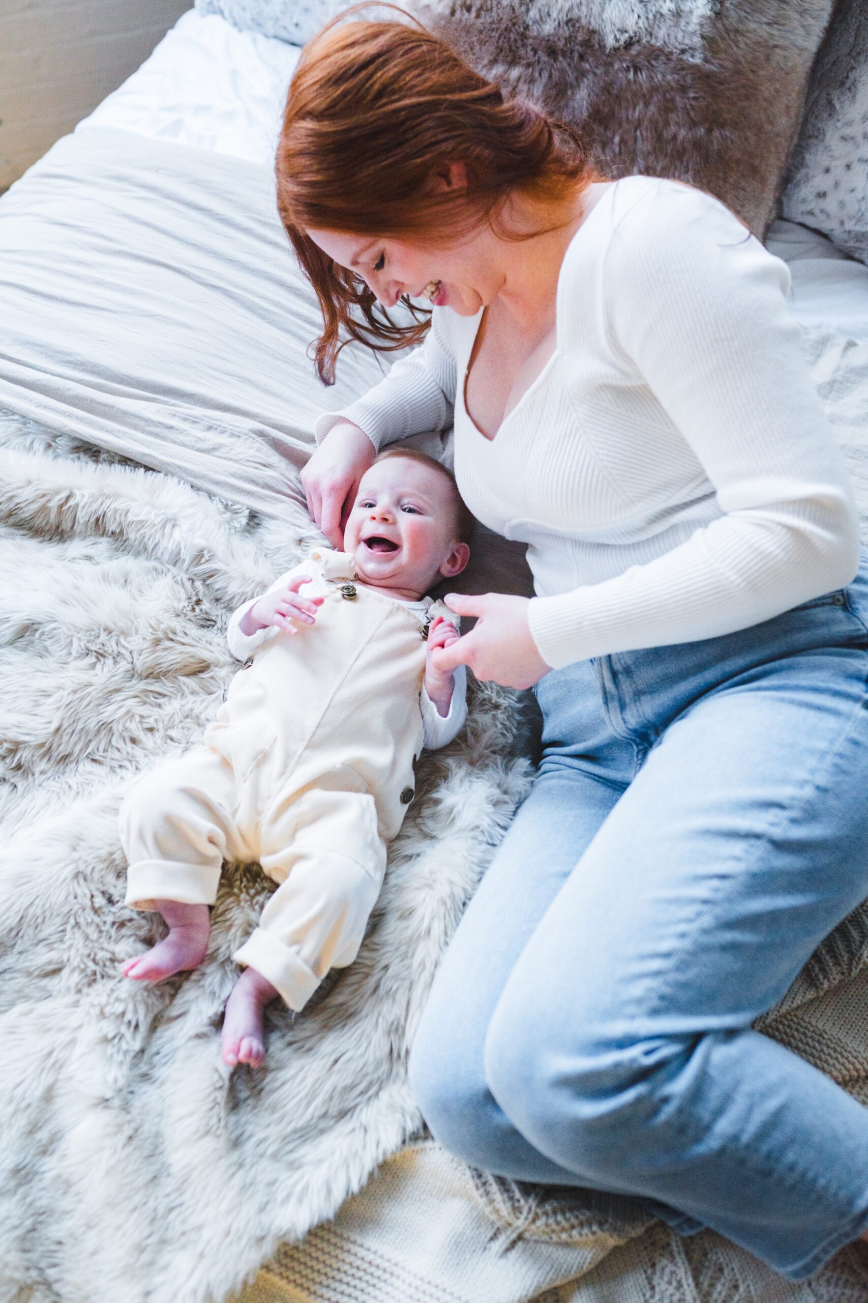 mom and baby on bed smiling | Montgomery Alabama Family Lifestyle Photographer | Melissa Sheridan Photography