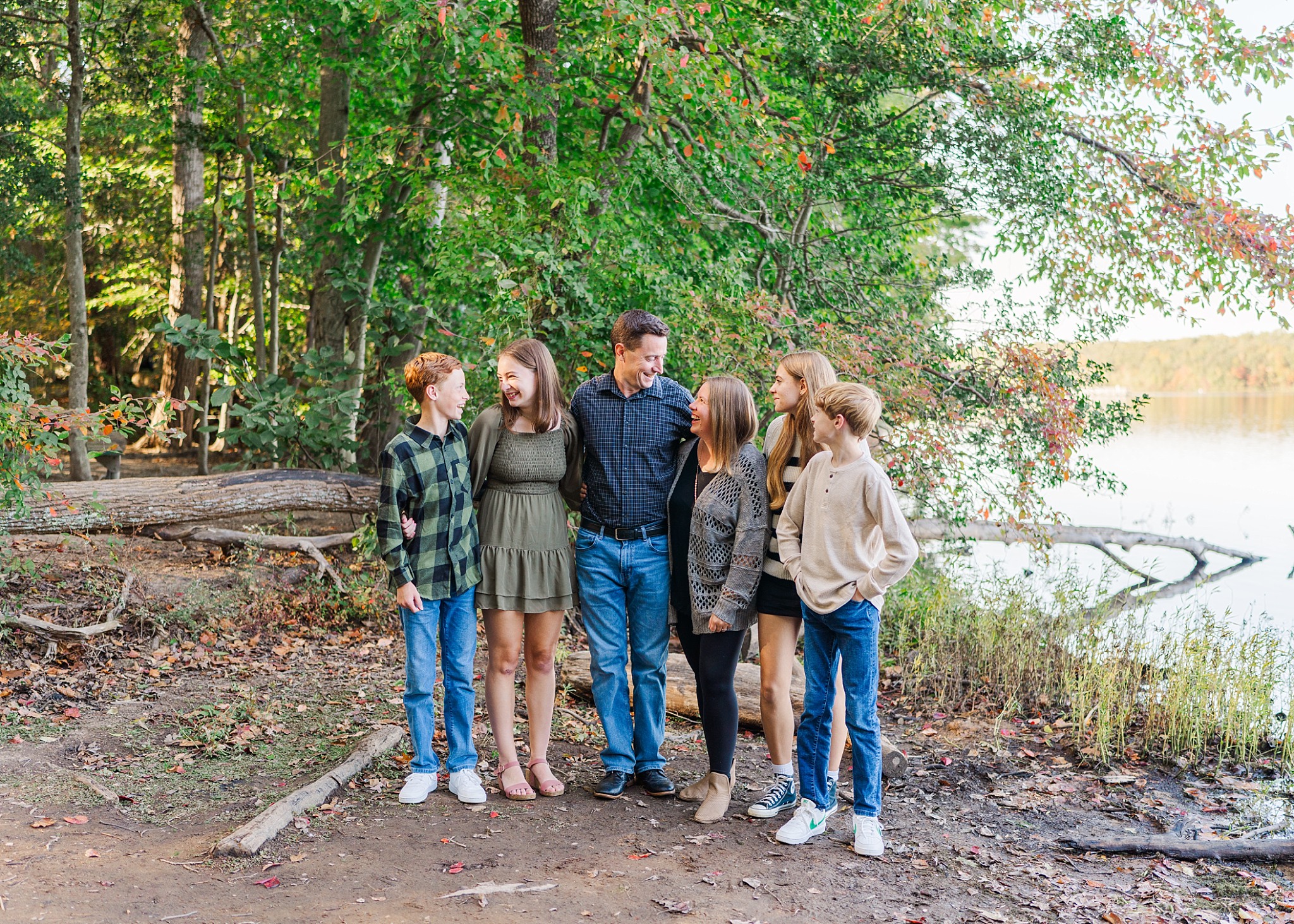 family of six standing by lake | Melissa Sheridan Photography
